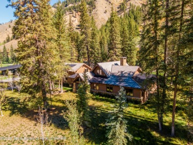 Welcome to a stunning residence nestled within the prestigious on Snake River Sporting Club in Wyoming - for sale on GolfHomes.com, golf home, golf lot