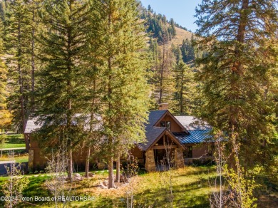 Welcome to a stunning residence nestled within the prestigious on Snake River Sporting Club in Wyoming - for sale on GolfHomes.com, golf home, golf lot