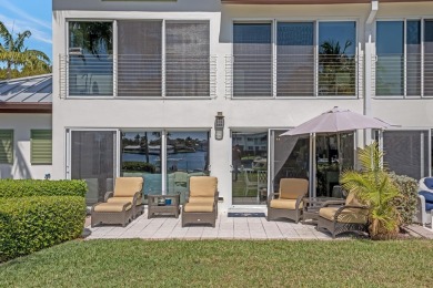 Experience waterfront living at its finest in this ground-floor on Card Sound Golf Club in Florida - for sale on GolfHomes.com, golf home, golf lot