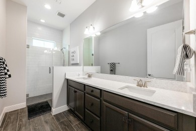 Under contract-accepting backup offers. Built in 2021 and better on Eagle Creek Golf Club in Florida - for sale on GolfHomes.com, golf home, golf lot