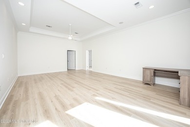 Located in a prestigious gated golf course community, this on Shell Landing Golf Club in Mississippi - for sale on GolfHomes.com, golf home, golf lot