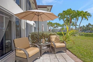 Experience waterfront living at its finest in this ground-floor on Card Sound Golf Club in Florida - for sale on GolfHomes.com, golf home, golf lot