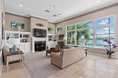 This luxurious estate sits on an amazing lakefront lot on a on Windermere Country Club in Florida - for sale on GolfHomes.com, golf home, golf lot