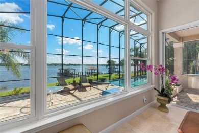 This luxurious estate sits on an amazing lakefront lot on a on Windermere Country Club in Florida - for sale on GolfHomes.com, golf home, golf lot