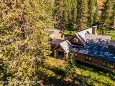 Welcome to a stunning residence nestled within the prestigious on Snake River Sporting Club in Wyoming - for sale on GolfHomes.com, golf home, golf lot