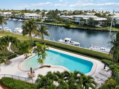 Experience waterfront living at its finest in this ground-floor on Card Sound Golf Club in Florida - for sale on GolfHomes.com, golf home, golf lot