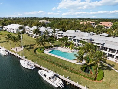 Experience waterfront living at its finest in this ground-floor on Card Sound Golf Club in Florida - for sale on GolfHomes.com, golf home, golf lot