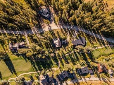 Welcome to a stunning residence nestled within the prestigious on Snake River Sporting Club in Wyoming - for sale on GolfHomes.com, golf home, golf lot