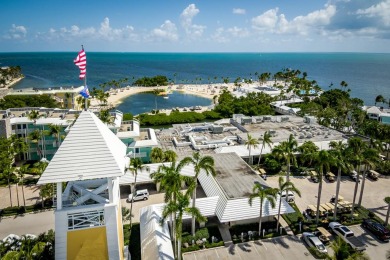 Experience waterfront living at its finest in this ground-floor on Card Sound Golf Club in Florida - for sale on GolfHomes.com, golf home, golf lot