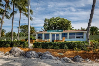 Experience waterfront living at its finest in this ground-floor on Card Sound Golf Club in Florida - for sale on GolfHomes.com, golf home, golf lot