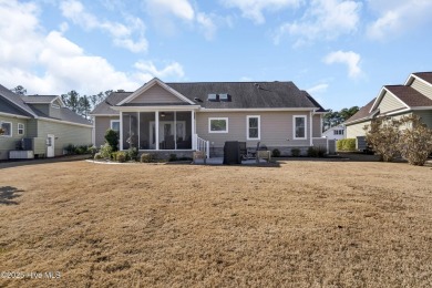 Discover this exquisite custom-built home, nestled within the on Brunswick Plantation and Golf Resorts in North Carolina - for sale on GolfHomes.com, golf home, golf lot