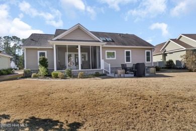 Discover this exquisite custom-built home, nestled within the on Brunswick Plantation and Golf Resorts in North Carolina - for sale on GolfHomes.com, golf home, golf lot