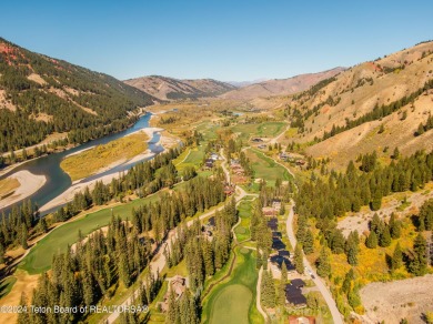 Welcome to a stunning residence nestled within the prestigious on Snake River Sporting Club in Wyoming - for sale on GolfHomes.com, golf home, golf lot