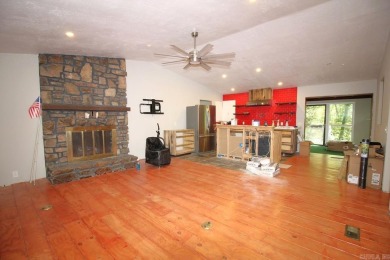 Remodel has been started leaving it up to a new buyer to on Cortez Golf Course in Arkansas - for sale on GolfHomes.com, golf home, golf lot