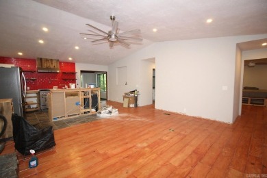 Remodel has been started leaving it up to a new buyer to on Cortez Golf Course in Arkansas - for sale on GolfHomes.com, golf home, golf lot