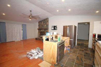 Remodel has been started leaving it up to a new buyer to on Cortez Golf Course in Arkansas - for sale on GolfHomes.com, golf home, golf lot