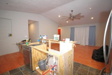 Remodel has been started leaving it up to a new buyer to on Cortez Golf Course in Arkansas - for sale on GolfHomes.com, golf home, golf lot