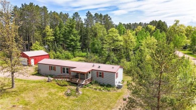 Well-kept and updated 3 bed/2 bath manufactured home on nearly on Moose Lake Golf Club in Minnesota - for sale on GolfHomes.com, golf home, golf lot