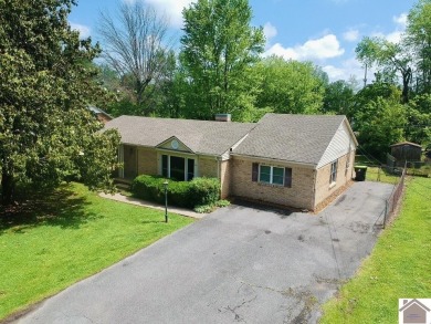 Charming 3 bed, 1.5 bath brick home features a split bedroom on Mayfield-Graves Country Club in Kentucky - for sale on GolfHomes.com, golf home, golf lot