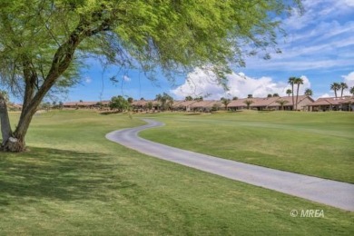 Gracefully nestled along Fairway 15 near the green of the Canyon on Wolf Creek At Paradise Canyon in Nevada - for sale on GolfHomes.com, golf home, golf lot