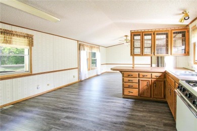 Well-kept and updated 3 bed/2 bath manufactured home on nearly on Moose Lake Golf Club in Minnesota - for sale on GolfHomes.com, golf home, golf lot