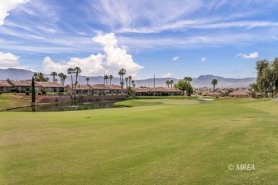 Gracefully nestled along Fairway 15 near the green of the Canyon on Wolf Creek At Paradise Canyon in Nevada - for sale on GolfHomes.com, golf home, golf lot