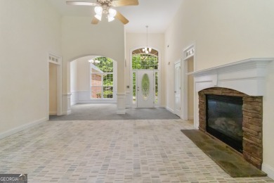 Gorgeous, all-brick, ranch home with side entry garage just on Canongate At Georgia National Golf Club in Georgia - for sale on GolfHomes.com, golf home, golf lot