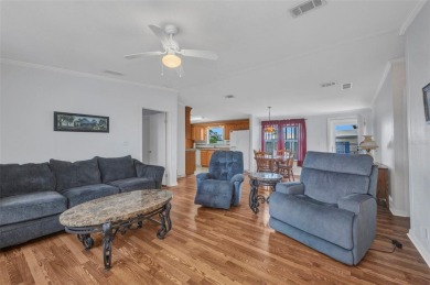 Welcome to 5748 Holiday Park Blvd.  This home is located in the on Sabal Trace Golf and Country Club in Florida - for sale on GolfHomes.com, golf home, golf lot