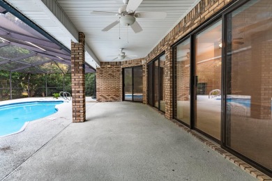 This remarkable, all brick home on 0.55 Acre with a screened on The Club At Hidden Creek in Florida - for sale on GolfHomes.com, golf home, golf lot