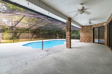 This remarkable, all brick home on 0.55 Acre with a screened on The Club At Hidden Creek in Florida - for sale on GolfHomes.com, golf home, golf lot