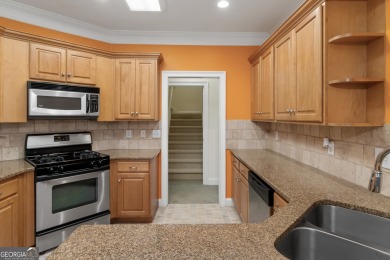 Gorgeous, all-brick, ranch home with side entry garage just on Canongate At Georgia National Golf Club in Georgia - for sale on GolfHomes.com, golf home, golf lot