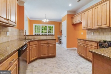 Gorgeous, all-brick, ranch home with side entry garage just on Canongate At Georgia National Golf Club in Georgia - for sale on GolfHomes.com, golf home, golf lot