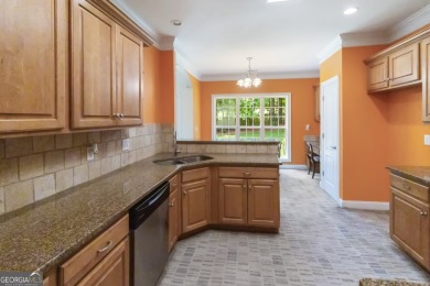 Gorgeous, all-brick, ranch home with side entry garage just on Canongate At Georgia National Golf Club in Georgia - for sale on GolfHomes.com, golf home, golf lot
