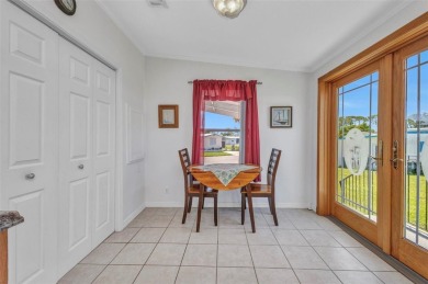 Welcome to 5748 Holiday Park Blvd.  This home is located in the on Sabal Trace Golf and Country Club in Florida - for sale on GolfHomes.com, golf home, golf lot