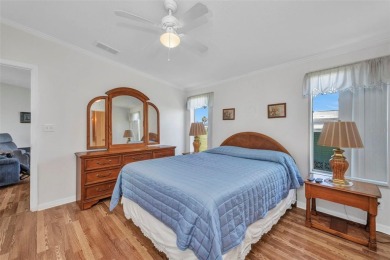 Welcome to 5748 Holiday Park Blvd.  This home is located in the on Sabal Trace Golf and Country Club in Florida - for sale on GolfHomes.com, golf home, golf lot