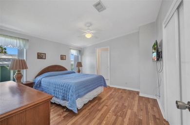 Welcome to 5748 Holiday Park Blvd.  This home is located in the on Sabal Trace Golf and Country Club in Florida - for sale on GolfHomes.com, golf home, golf lot