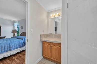 Welcome to 5748 Holiday Park Blvd.  This home is located in the on Sabal Trace Golf and Country Club in Florida - for sale on GolfHomes.com, golf home, golf lot