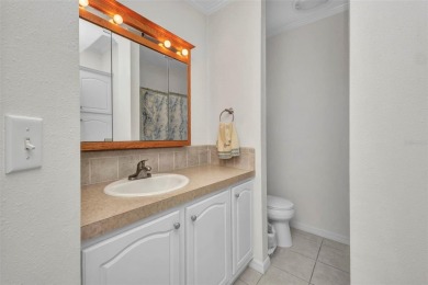 Welcome to 5748 Holiday Park Blvd.  This home is located in the on Sabal Trace Golf and Country Club in Florida - for sale on GolfHomes.com, golf home, golf lot