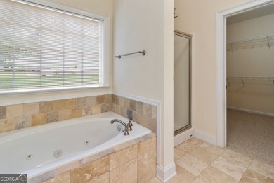 Gorgeous, all-brick, ranch home with side entry garage just on Canongate At Georgia National Golf Club in Georgia - for sale on GolfHomes.com, golf home, golf lot