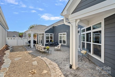 Perfectly located in a highly sought-after, low-maintenance on The Peninsula Club in North Carolina - for sale on GolfHomes.com, golf home, golf lot