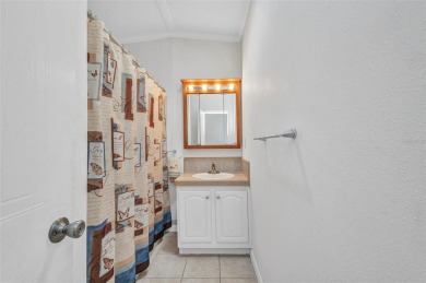 Welcome to 5748 Holiday Park Blvd.  This home is located in the on Sabal Trace Golf and Country Club in Florida - for sale on GolfHomes.com, golf home, golf lot