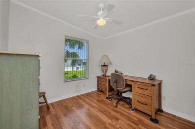Welcome to 5748 Holiday Park Blvd.  This home is located in the on Sabal Trace Golf and Country Club in Florida - for sale on GolfHomes.com, golf home, golf lot