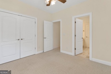 Gorgeous, all-brick, ranch home with side entry garage just on Canongate At Georgia National Golf Club in Georgia - for sale on GolfHomes.com, golf home, golf lot
