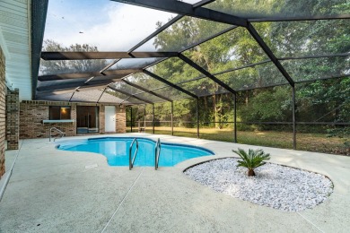 This remarkable, all brick home on 0.55 Acre with a screened on The Club At Hidden Creek in Florida - for sale on GolfHomes.com, golf home, golf lot