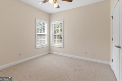 Gorgeous, all-brick, ranch home with side entry garage just on Canongate At Georgia National Golf Club in Georgia - for sale on GolfHomes.com, golf home, golf lot
