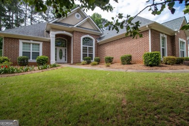 Gorgeous, all-brick, ranch home with side entry garage just on Canongate At Georgia National Golf Club in Georgia - for sale on GolfHomes.com, golf home, golf lot