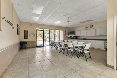 Welcome to 5748 Holiday Park Blvd.  This home is located in the on Sabal Trace Golf and Country Club in Florida - for sale on GolfHomes.com, golf home, golf lot