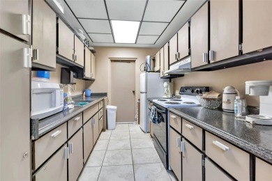 Welcome to 5748 Holiday Park Blvd.  This home is located in the on Sabal Trace Golf and Country Club in Florida - for sale on GolfHomes.com, golf home, golf lot