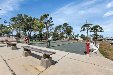 Welcome to 5748 Holiday Park Blvd.  This home is located in the on Sabal Trace Golf and Country Club in Florida - for sale on GolfHomes.com, golf home, golf lot