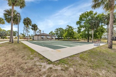 Welcome to 5748 Holiday Park Blvd.  This home is located in the on Sabal Trace Golf and Country Club in Florida - for sale on GolfHomes.com, golf home, golf lot